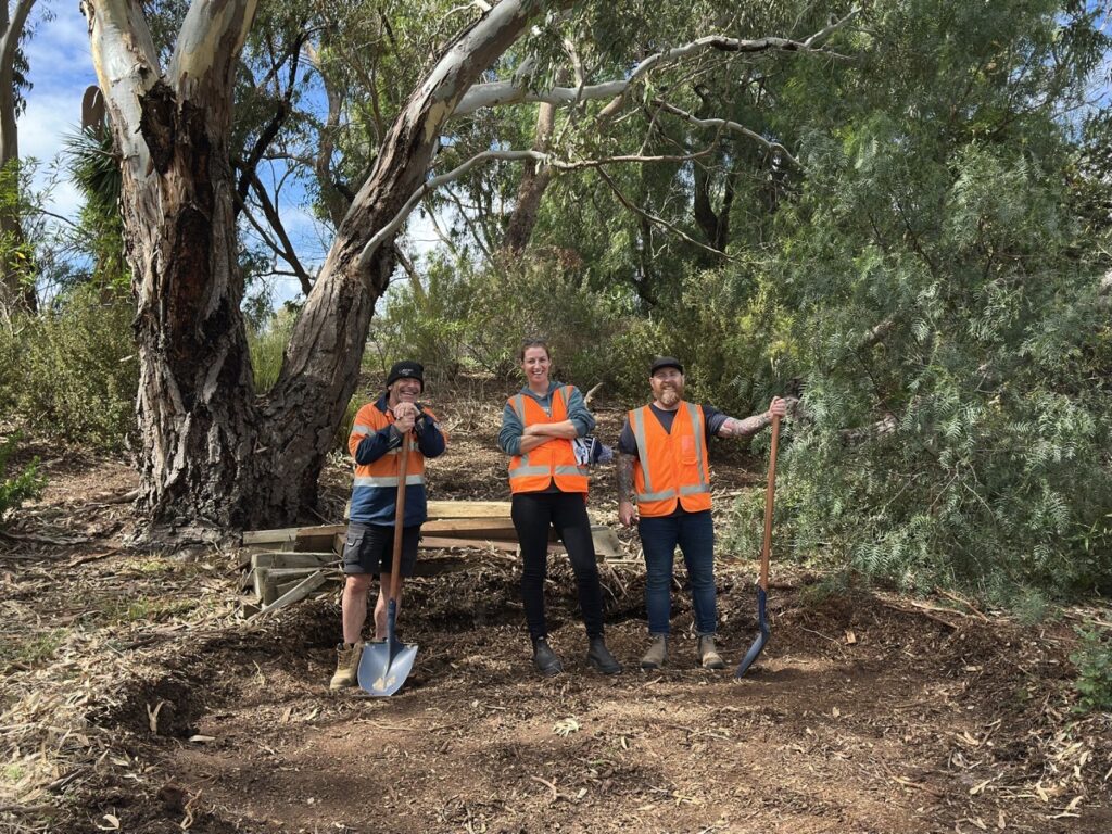 Cobram Estate team members during a mulching working bee at Kevin Hoffman Walk